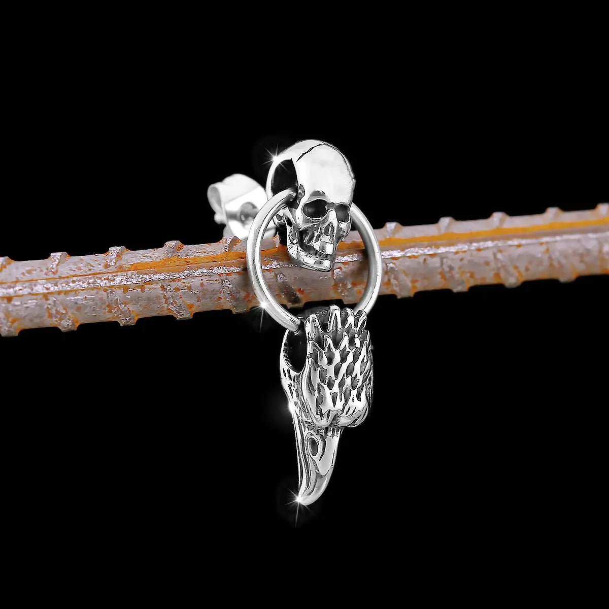 Brincos Corvo Nórdico