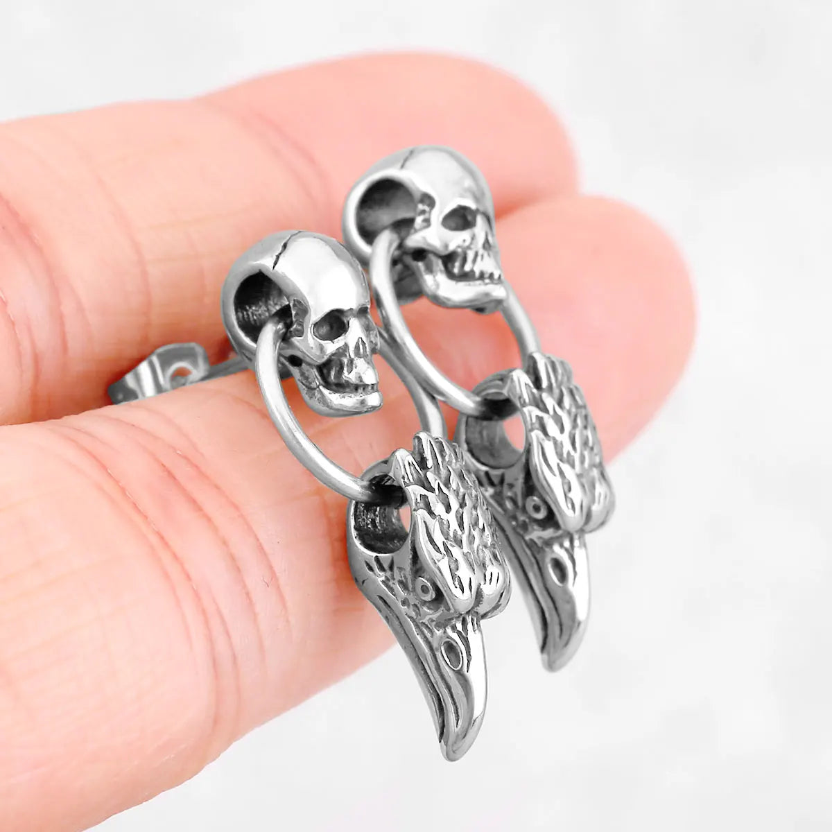 Brincos Corvo Nórdico